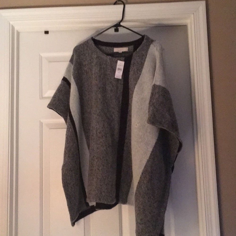 Grey and black poncho